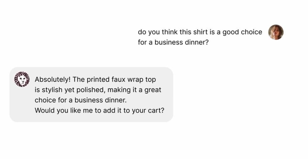 AI shopping assistant recommending a printed wrap top as suitable for a business dinner and offering to add it to the cart.